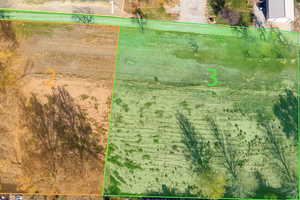 Aerial overview of property's location featuring property boundaries highlighted