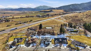 Aerial view of residential area with a mountainous background