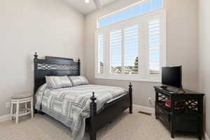 Bedroom featuring light colored carpet and recessed lighting