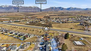 Aerial perspective of suburban area featuring mountains