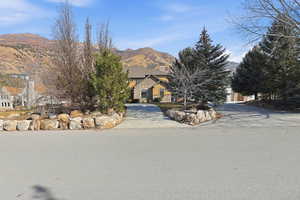 View of front of property featuring a mountain view