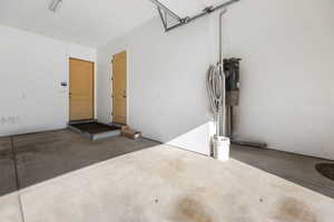 Garage with a central vacuum unit