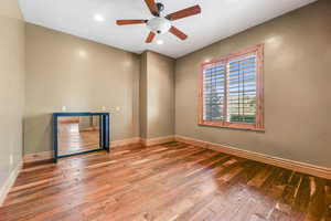 Unfurnished room with light wood-style flooring, ceiling fan, and recessed lighting