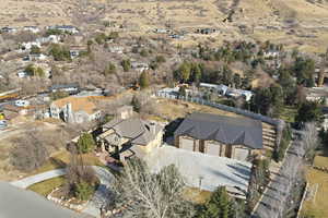 Aerial view of property's location featuring nearby suburban area