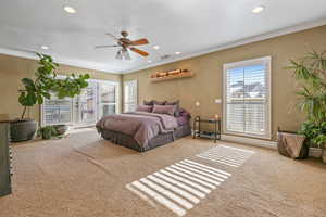 Carpeted bedroom with access to outside, recessed lighting, ornamental molding, and a ceiling fan