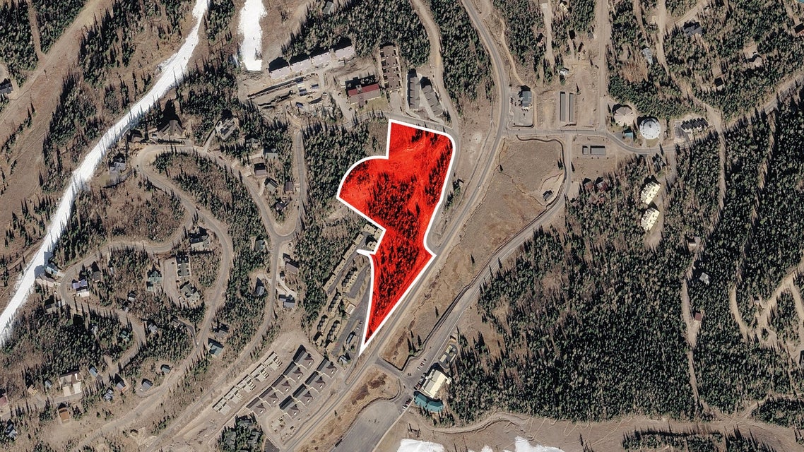 Aerial overview of property's location featuring property boundaries highlighted