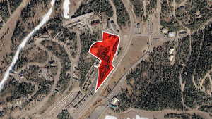 Aerial overview of property's location featuring property boundaries highlighted