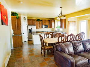 Dining room with hanging lights