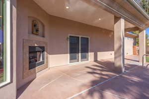 View of patio / terrace with a fireplace