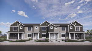 View of front of home with a porch and board and batten siding
