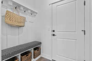 Mudroom featuring wood finished floors