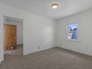 Bedroom 2 looking into bedroom 1