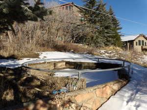 Newer trampoline fabric removed for winter and stored in garage