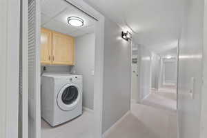 Laundry room with washer / dryer, and cabinet space