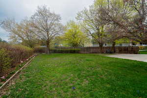 View of fenced backyard