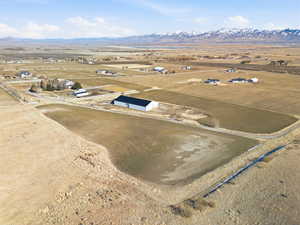 Aerial view of sparsely populated area featuring a mountain backdrop