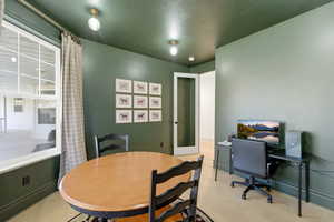 Office space with light wood finished floors