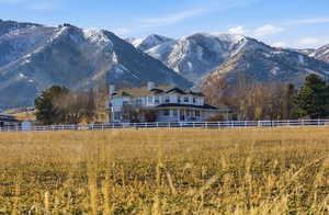 View of mountain background featuring rural landscape