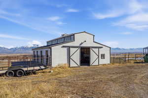 View of barn featuring a mountain view