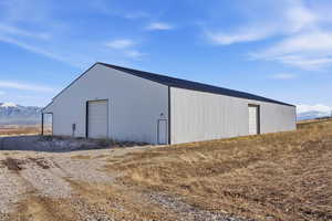 View of pole building featuring a mountain view