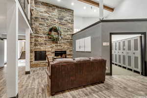 Living room featuring a fireplace and light wood-style flooring
