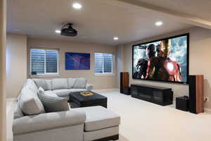 Home theater room featuring carpet floors and recessed lighting