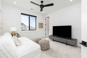 Bedroom with carpet, a ceiling fan, and recessed lighting