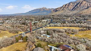 Aerial view of residential area featuring a mountain backdrop