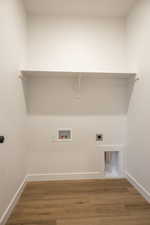 Laundry room with light wood finished floors, electric dryer hookup, and washer hookup