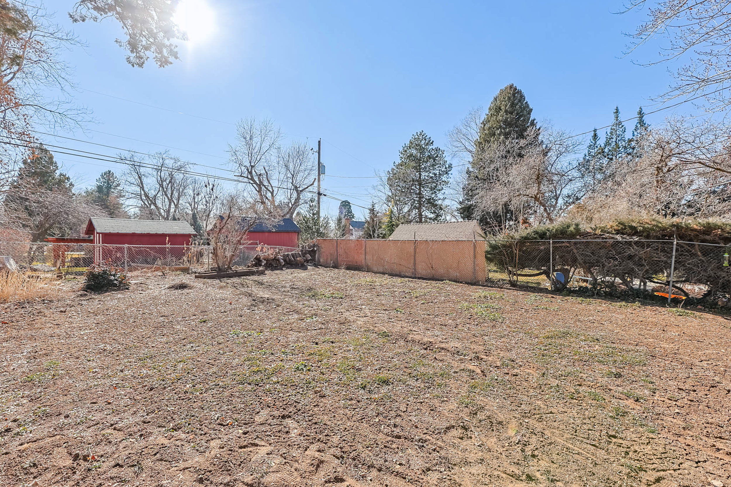 View of fenced backyard