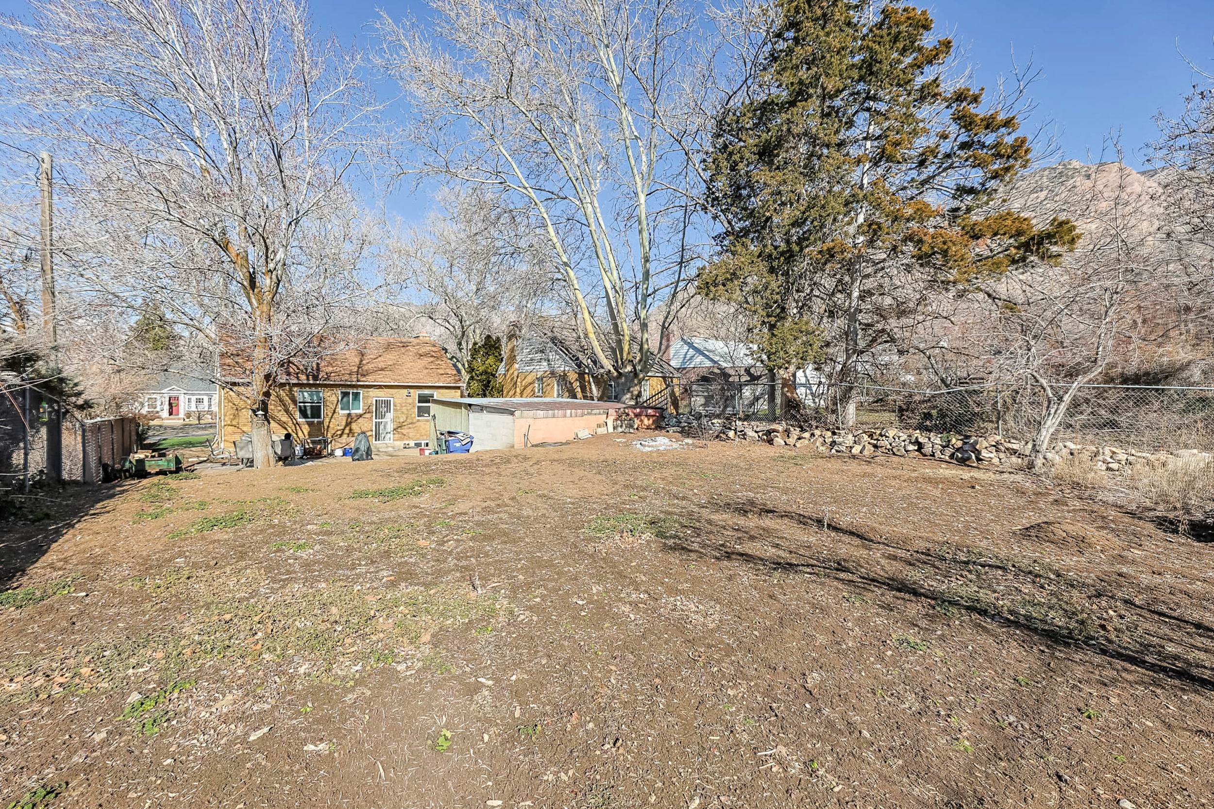 View of fenced backyard