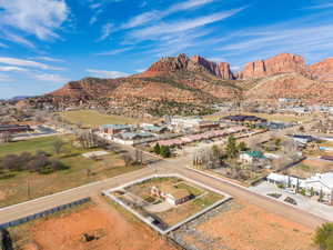 Aerial perspective of suburban area with mountains