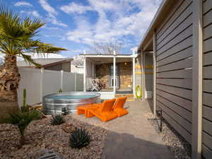 View of patio / terrace featuring a hot tub