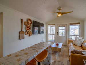Living area with a ceiling fan