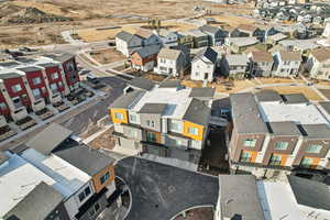Aerial overview of property's location featuring nearby suburban area