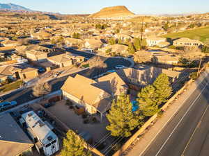 Aerial perspective of suburban area with a mountain backdrop