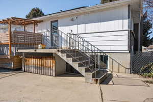 Doorway to property with a patio