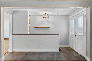 Foyer with baseboards