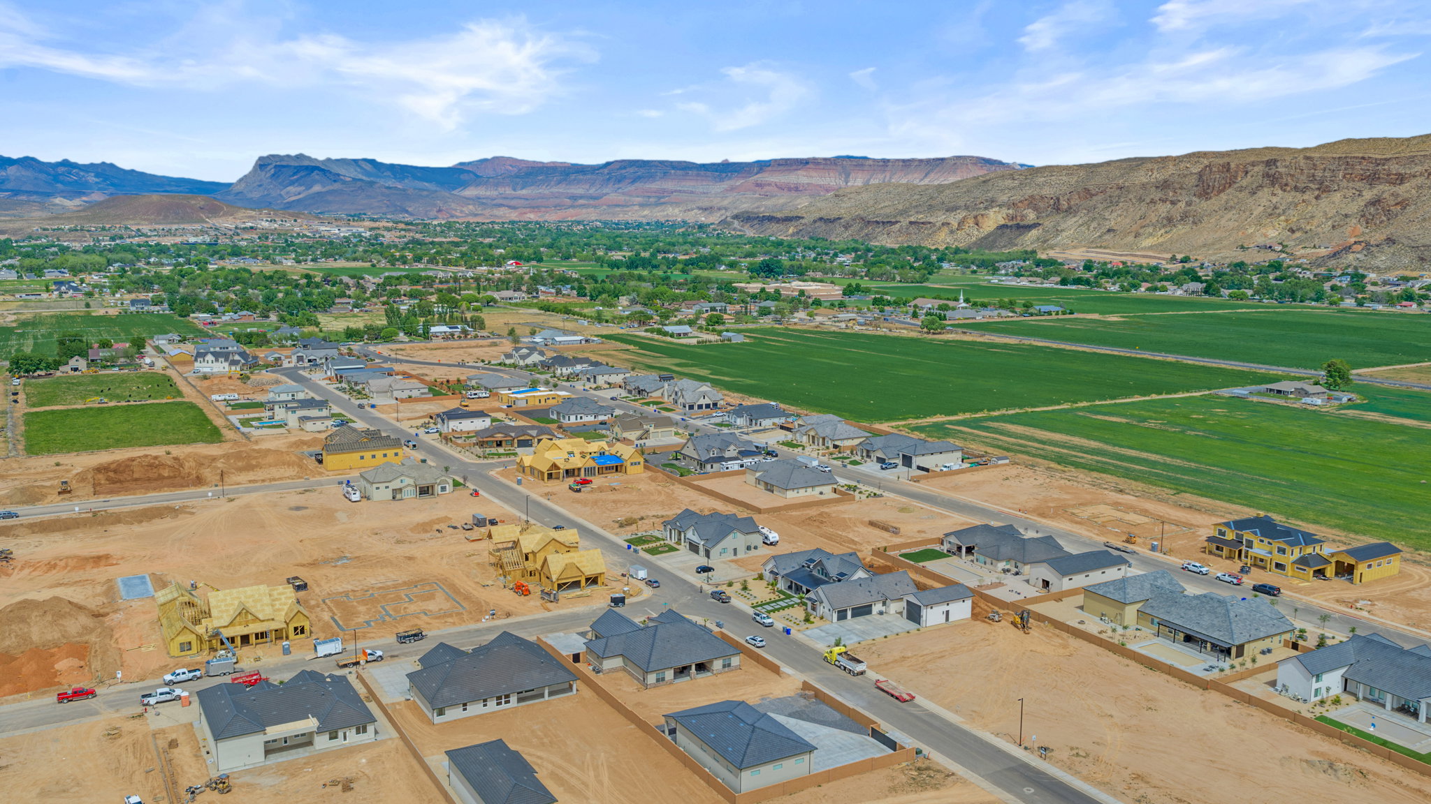 View of property location with a mountainous background and nearby suburban area