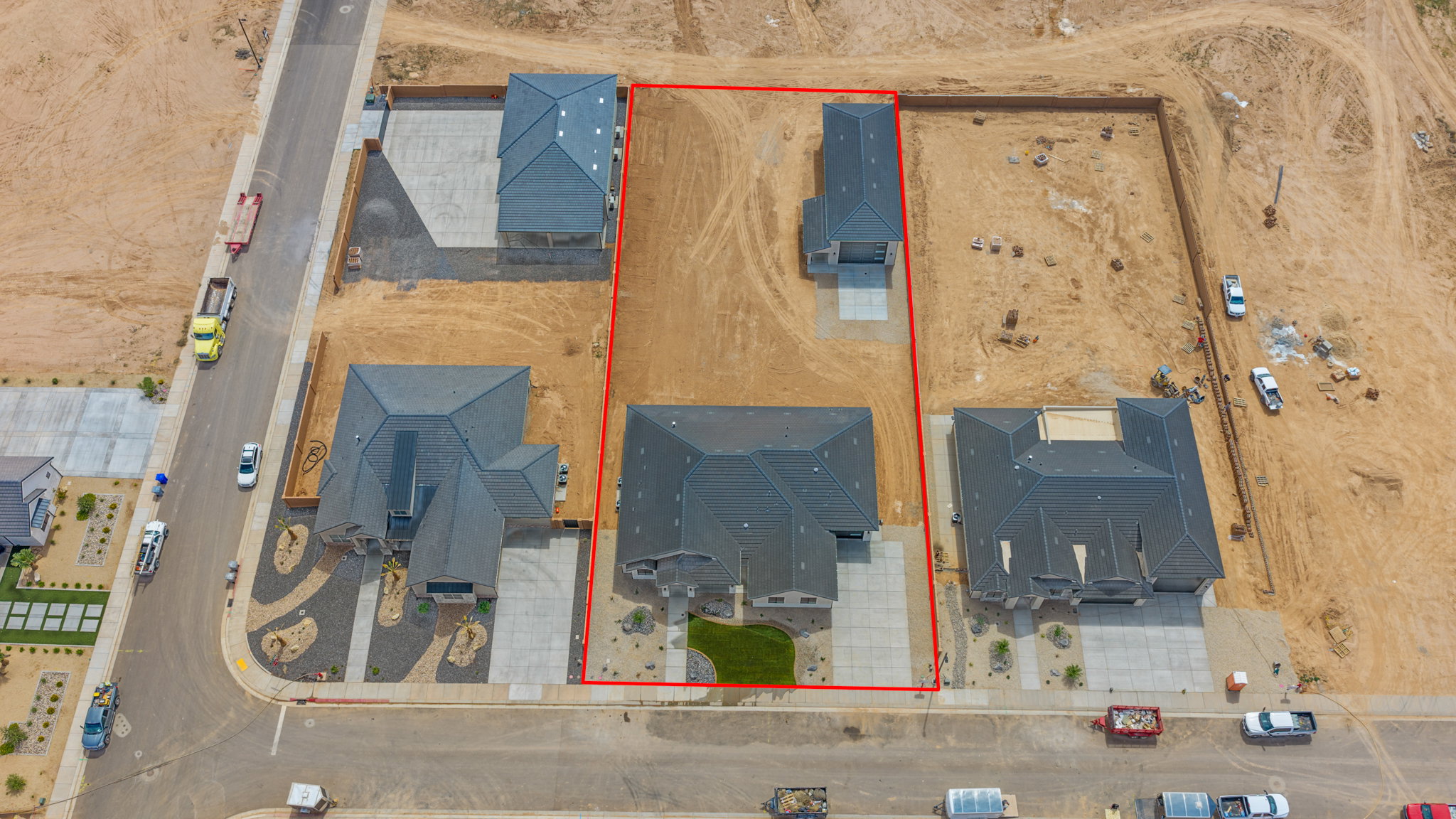 Aerial view of property and surrounding area featuring property parcel outlined