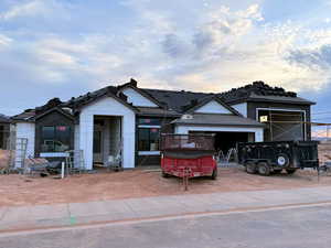 View of front of property with a tiled roof