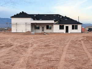 Back of house featuring a mountain view