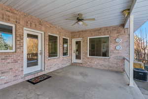 View of patio featuring ceiling fan