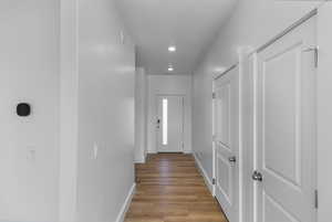 Entryway featuring wood finished floors and recessed lighting