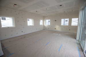 Unfurnished room featuring baseboards