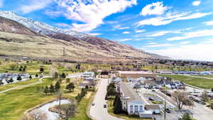 Aerial view of residential area with a mountain backdrop