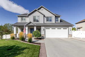 Craftsman house featuring a gate, driveway, a porch, a shingled roof, and an attached garage
