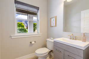 Bathroom featuring vanity and light tile patterned flooring