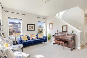 Living room featuring carpet