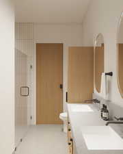 Bathroom with a stall shower and double vanity